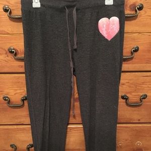 Comfy grey sweatpants with pink sequined heart